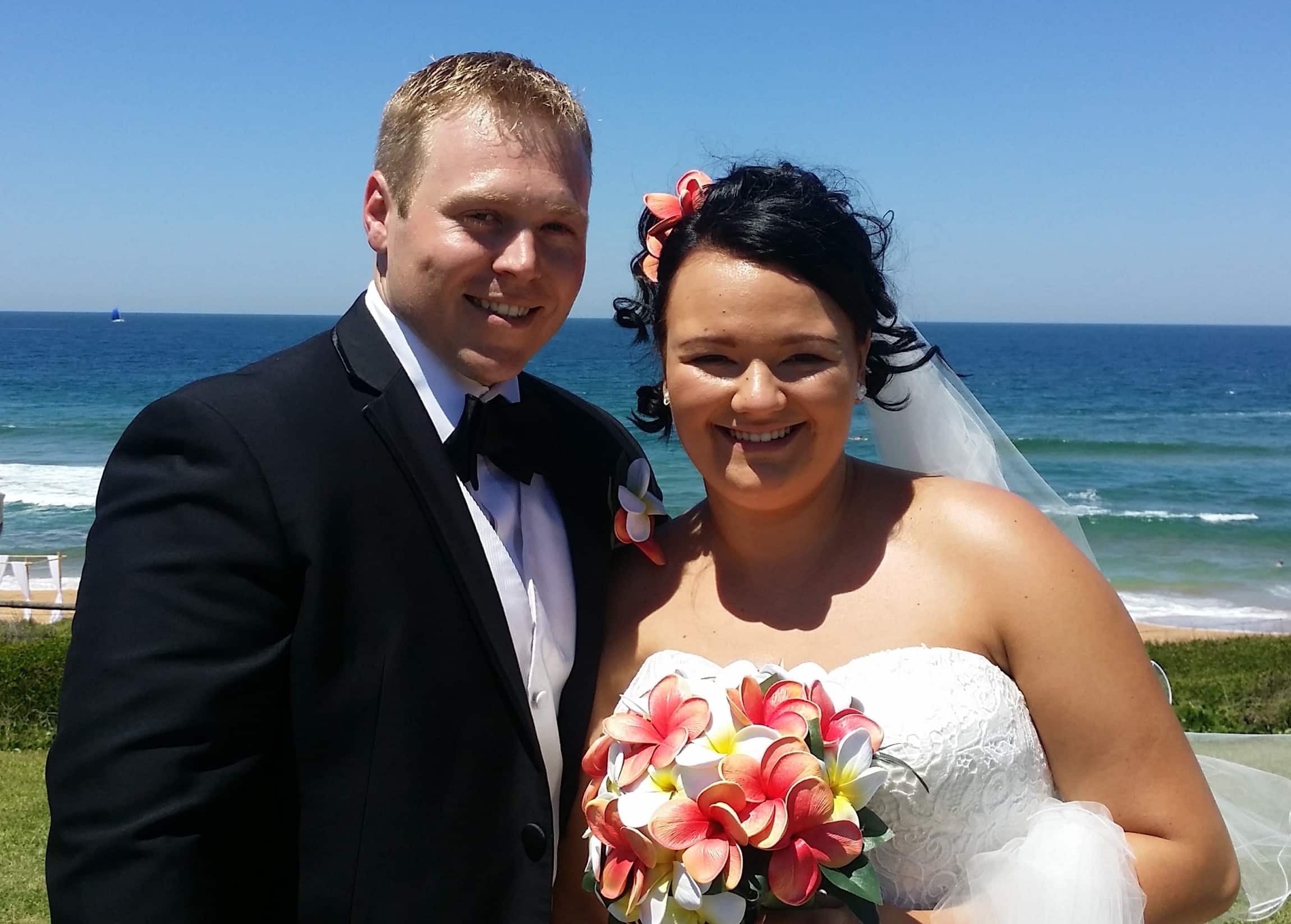 Greg & Sabrina on their wedding day - beach wedding outdoor clear blue skies