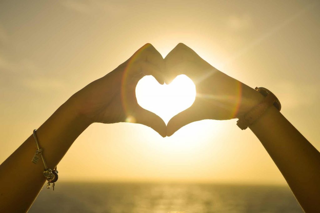 Marriage Equality hands together make heart sun