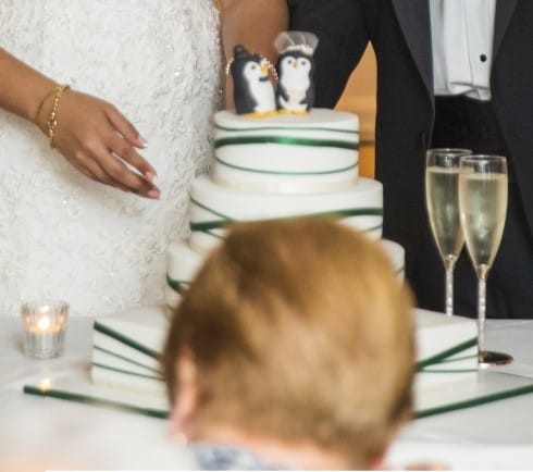 Cutting the cake guest in the way Smart Phones & Social Media on your Wedding Day