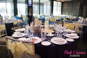 Reception setup navy table cloth and gold plates WM CHECKED