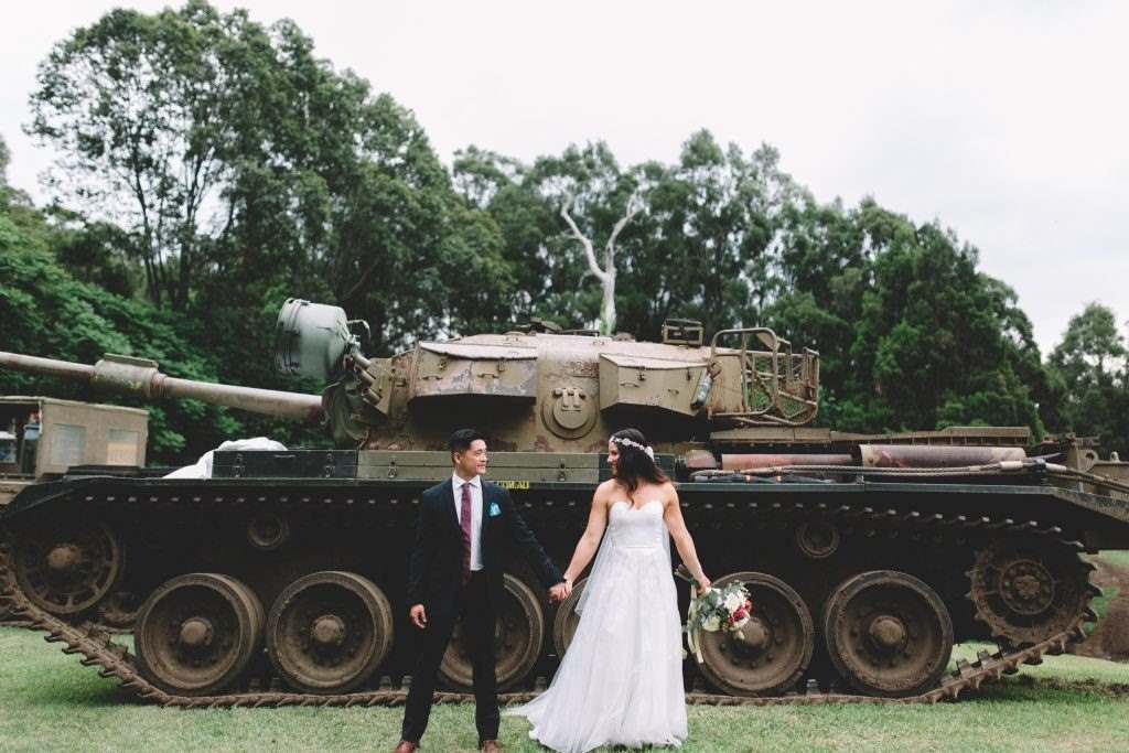 Alternative Wedding Transport Tank Wedding Bride Groom Holding Hands