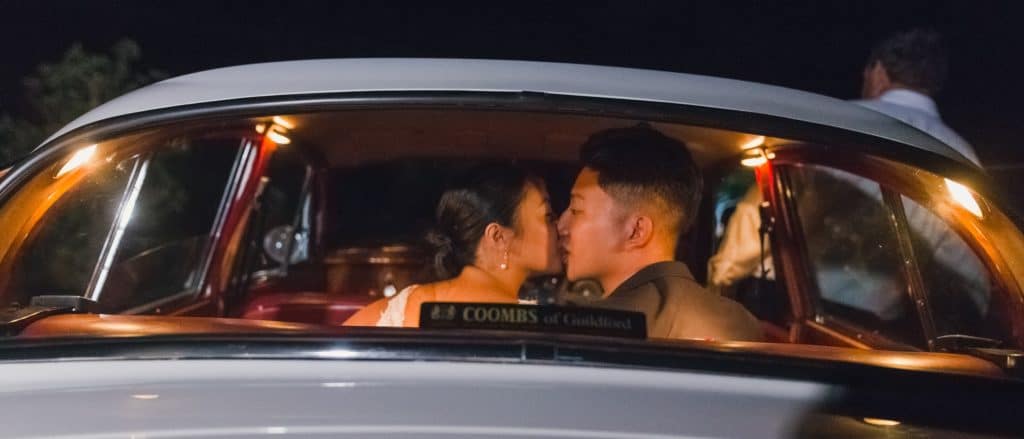 Wedding Couple Bride Groom Getaway Car Exit Kiss
