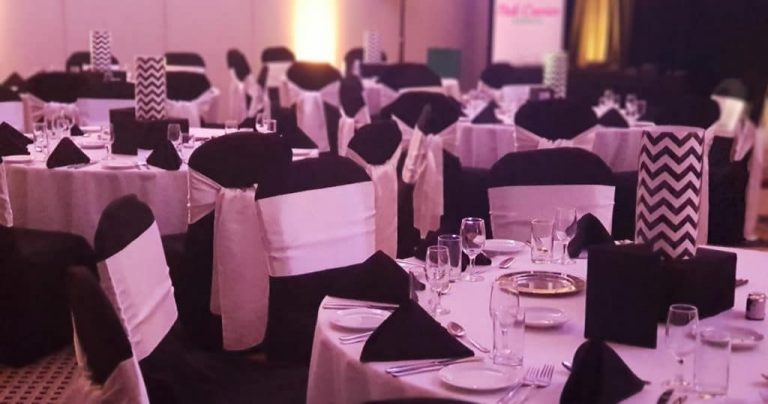 A corporate awards night gala dinner - black and white theme - celebrate company milestones