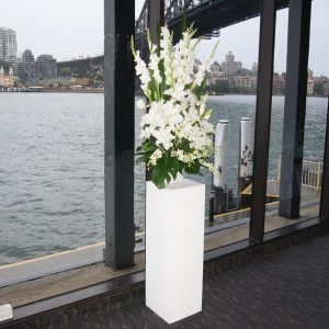 White Pedestal with Flower Arrangement