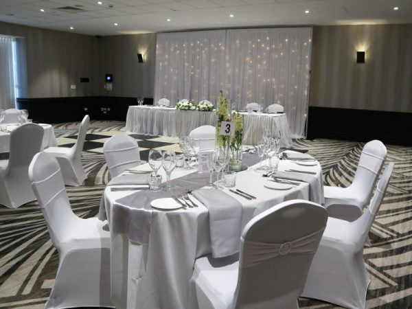 wedding bridal table with backdrop and fairy lights