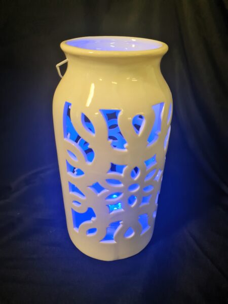 white ceramic lantern with blue led light