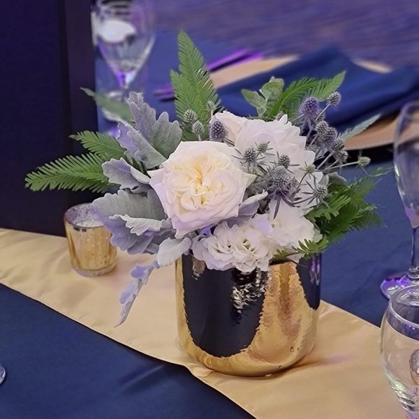 Flowers in gold vase