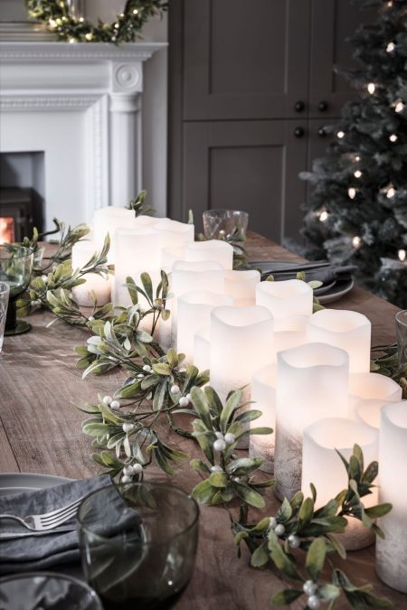 LED candles with greenery Christmas table runner