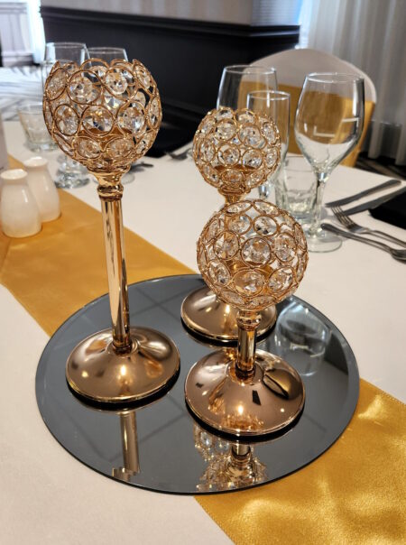 gold crystal trio centrepiece on mirror