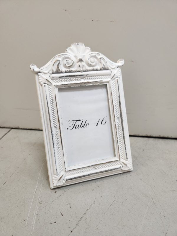 white vintage look table numbers