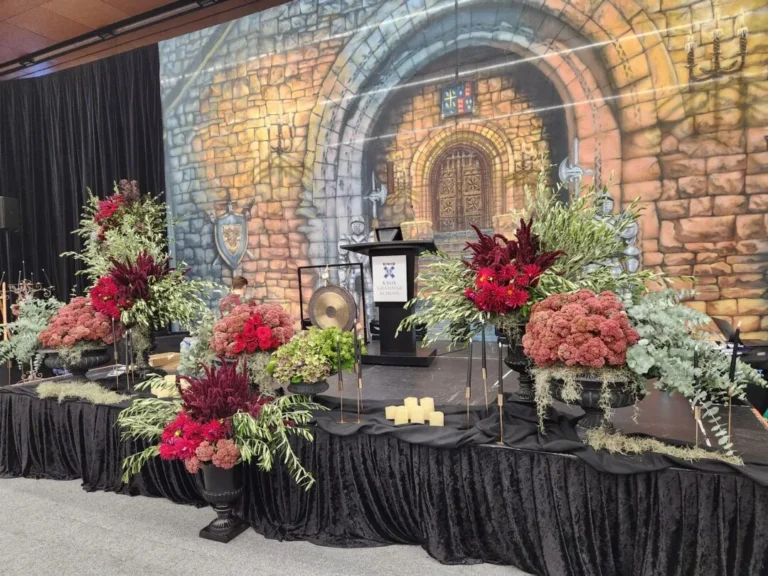 Stage with Flowers and Themed Backdrop
